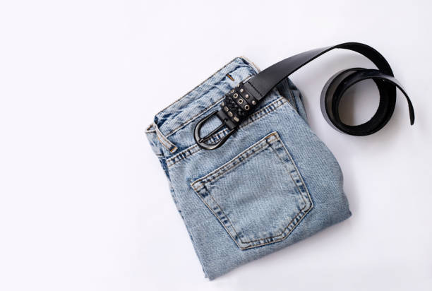istock Jeans and belt isolated on white background. 1310989106
