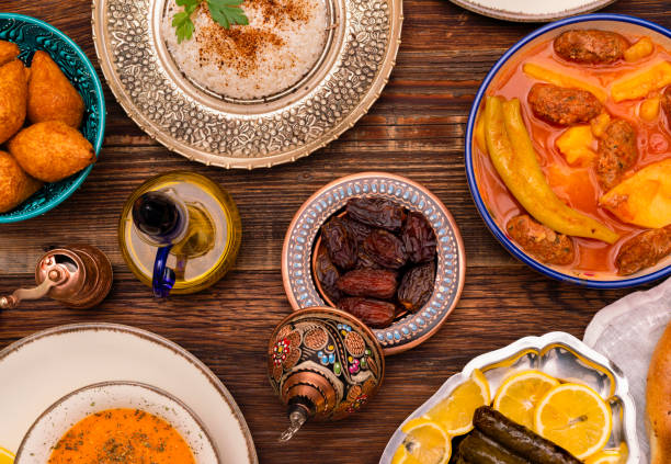 istock Traditional Turkish dinner include pilaf (boiled rice), lentil soup, Izmir meat balls with potatoes, sarma, kibbeh (aka icli kofte), dried date fruits. Ramadan iftar (evening meal after fasting). 1310995037