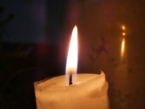 istock Candle in front of a vessel 1310996726