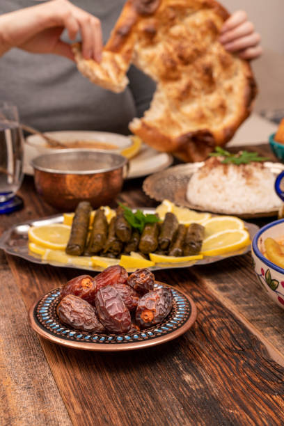 istock Traditional Turkish dinner include pilaf (boiled rice), lentil soup, Izmir meat balls with potatoes, sarma, kibbeh (aka icli kofte), dried date fruits. Ramadan iftar (evening meal after fasting). 1310996894