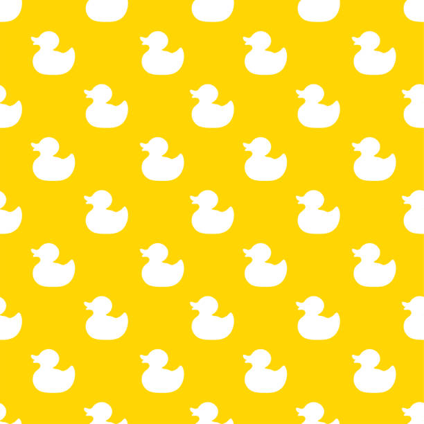 Yellow rubber duck.  Seamless pattern. Texture for fabric, wrapping, wallpaper. Decorative print.Vector illustration Yellow rubber duck.  Seamless pattern. Texture for fabric, wrapping, wallpaper. Decorative print.Vector illustration duck stock illustrations