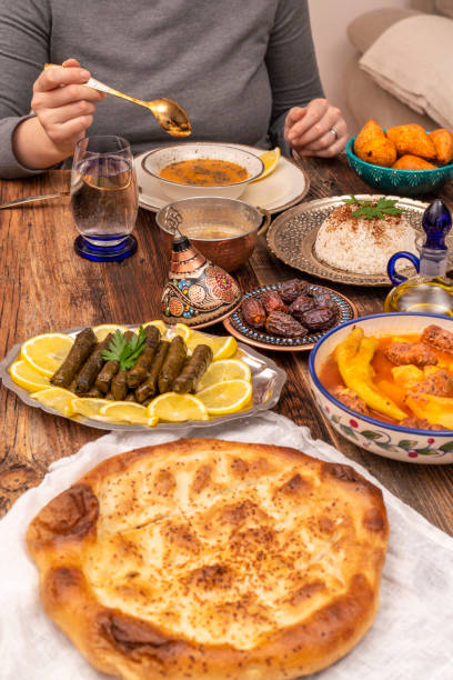istock Traditional Turkish dinner include pilaf (boiled rice), lentil soup, Izmir meat balls with potatoes, sarma, kibbeh (aka icli kofte), dried date fruits. Ramadan iftar (evening meal after fasting). 1310997554