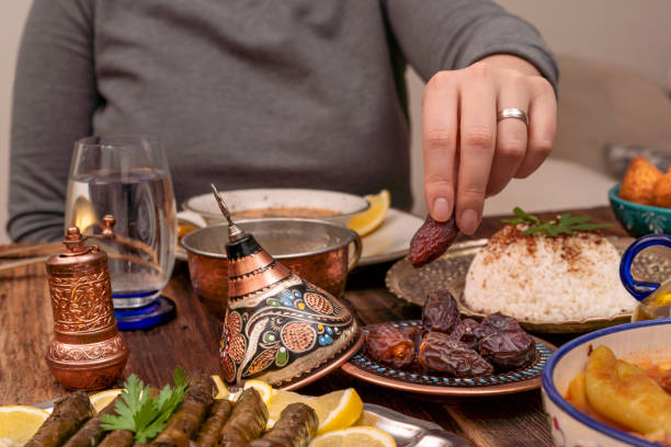 istock Traditional Turkish dinner include pilaf (boiled rice), lentil soup, Izmir meat balls with potatoes, sarma, kibbeh (aka icli kofte), dried date fruits. Ramadan iftar (evening meal after fasting). 1310997590