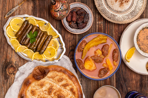 istock Traditional Turkish dinner include pilaf (boiled rice), lentil soup, Izmir meat balls with potatoes, sarma, kibbeh (aka icli kofte), dried date fruits. Ramadan iftar (evening meal after fasting). 1310997591