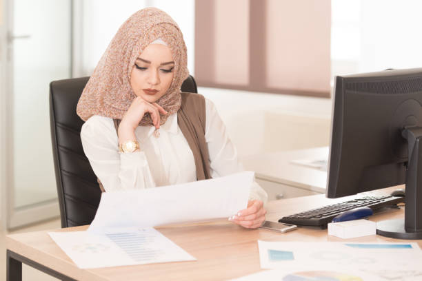 istock Muslim Businesswoman Working With Documents In The Office 1310997648