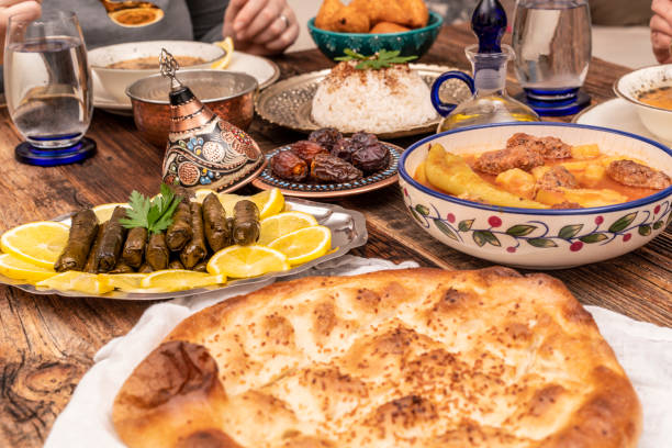 istock Traditional Turkish dinner include pilaf (boiled rice), lentil soup, Izmir meat balls with potatoes, sarma, kibbeh (aka icli kofte), dried date fruits. Ramadan iftar (evening meal after fasting). 1310997719