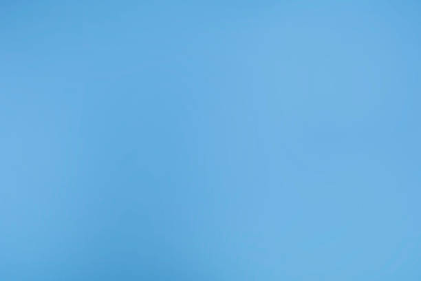 istock Cloudy blue in defocused blur motion abstract background 1311011429