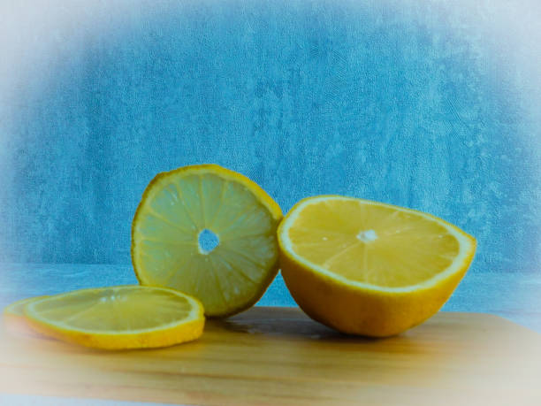 istock sliced lemon on a cutting board on a wooden background 1311018002