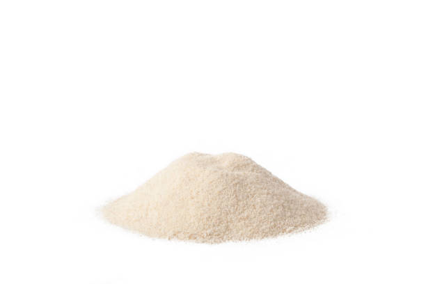 istock A pile of dry semolina lying on the table. 1311021288