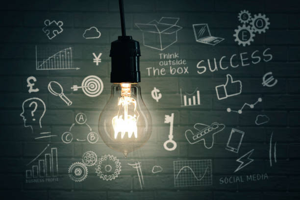 istock Close up of a bright light bulb with doodles 1311024044