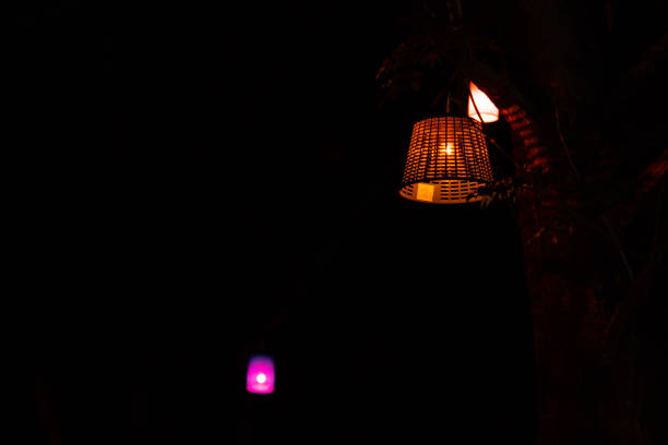 lamp to colorful light on dark night background
