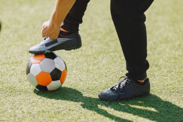 istock Sporman is playing football and practising with the ball 1311033249