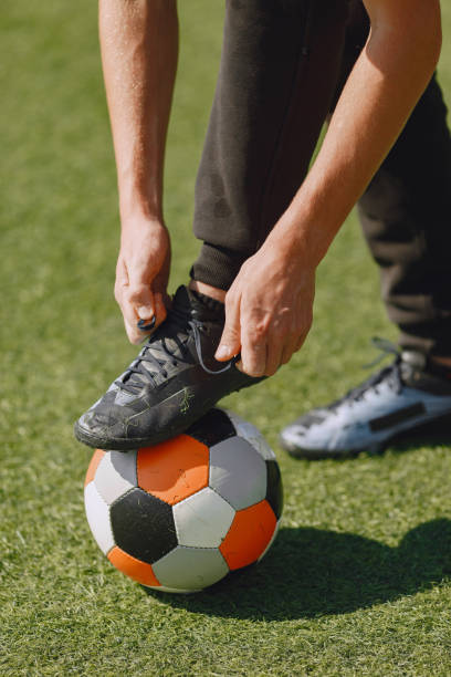 istock Sporman is playing football and practising with the ball 1311033252