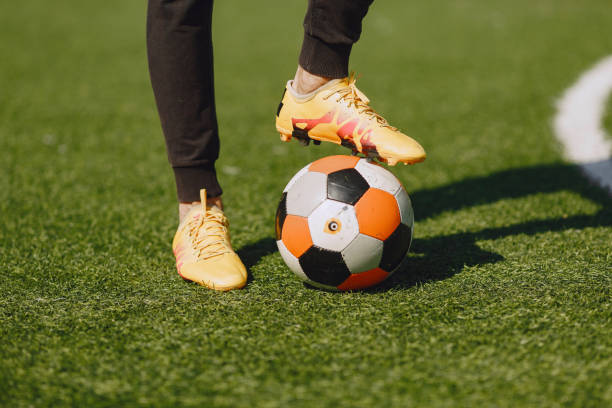 istock Sporman is playing football and practising with the ball 1311033866