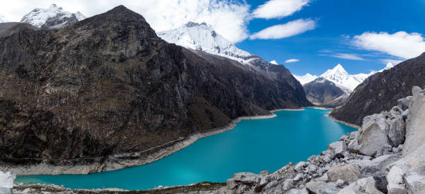 istock Lake Paron amazing panoramic view, behind there is mount called Pyramid full of snow. 1311033870