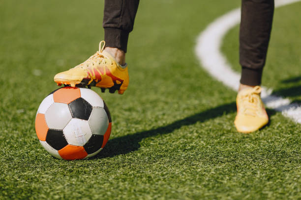 istock Sporman is playing football and practising with the ball 1311033872