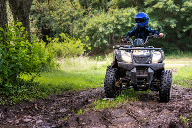 istock A trip on the ATV on the red road. 1311036373