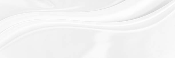 istock White gray satin texture that is white silver fabric silk panoramic background with beautiful soft blur pattern natural. 1311038422