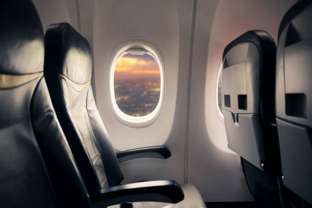istock Empty seat on airplane while covid-19 outbreak destroy travel and airline business 1311039607