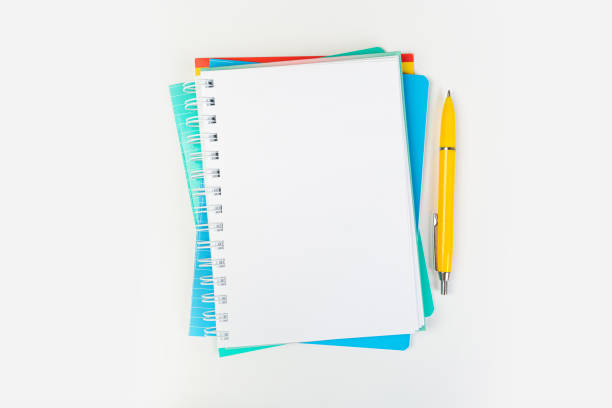 istock top view of open notebook with pen on gray background, school notebooks with coil spring, office notebook flat lay 1311039809