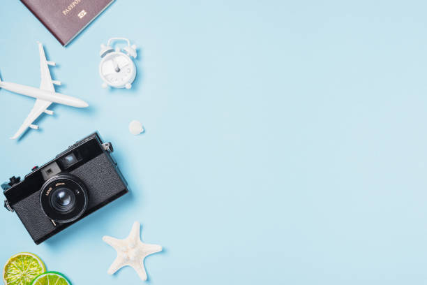 istock camera films, airplane, passport, starfish, shells traveler tropical accessories 1311040947