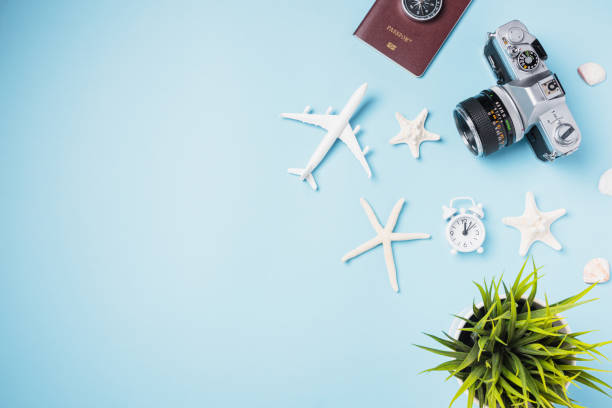 istock camera films, airplane, starfish, shells, passport traveler tropical accessories 1311040954