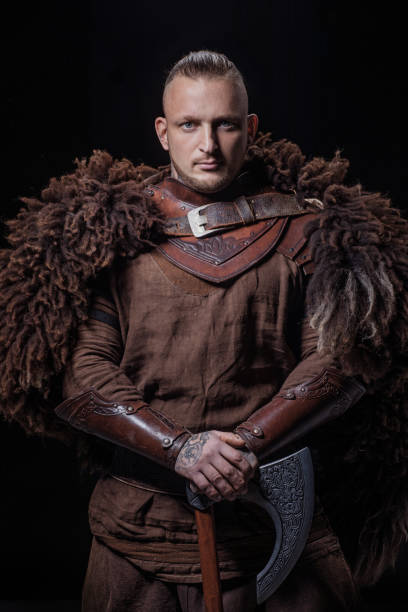 istock Weapon wielding viking warrior in studio shot 1311042240