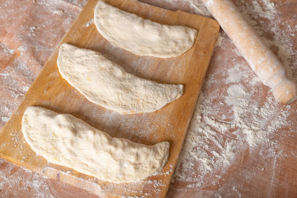 istock Resting fresh Italian raw pizza 1311046586
