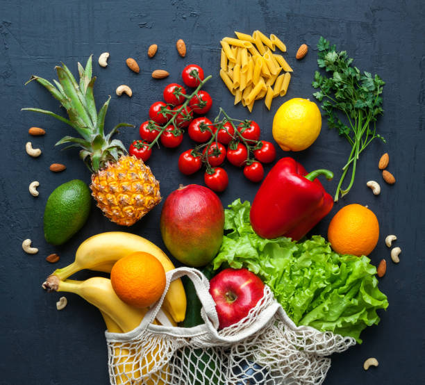 istock Healthy vegetarian food in a string shopping bag 1311051909