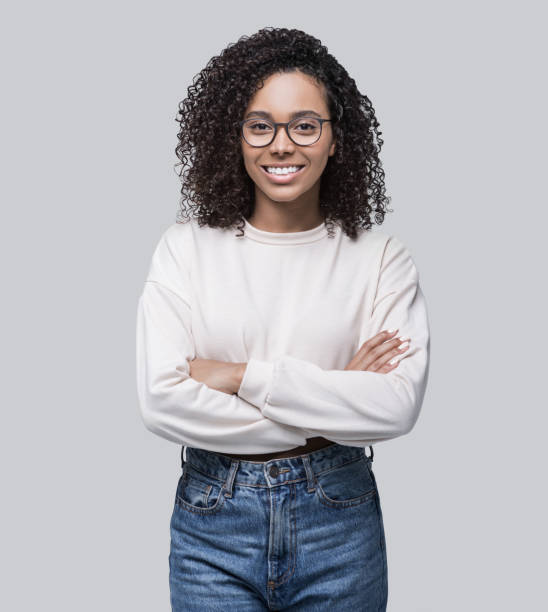 istock Happy young woman studio portrait 1311053055