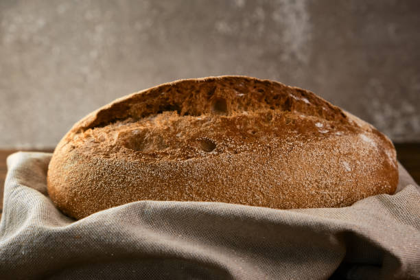 istock Wholegrain rye bread on a cutting board 1311054498