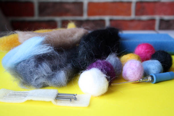 istock Beads made of felted wool. Needlework at home. 1311054624