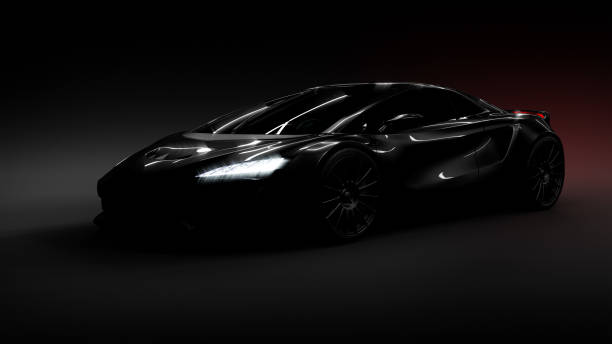 istock sportscar silhouette on black background 1311057645