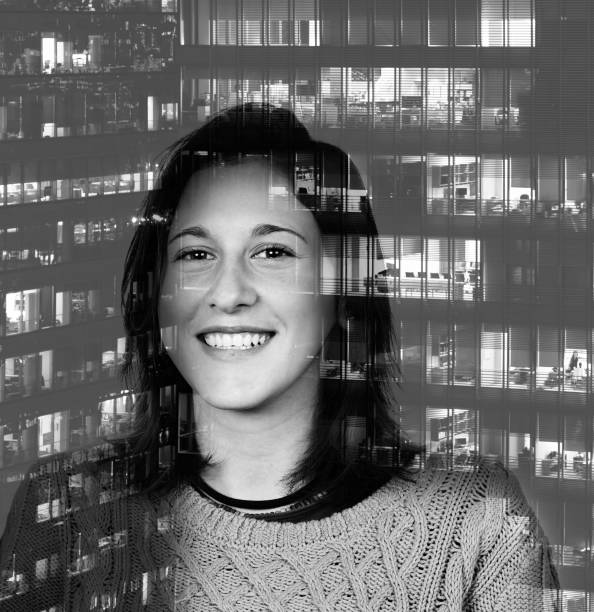 istock Abstract image of young woman smiling. 1311060920