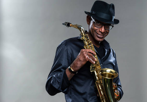 istock Musician with saxophone and big smile 1311062640