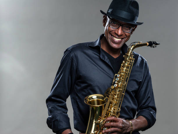 istock Musician with saxophone and big smile 1311062682