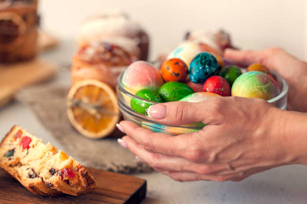 istock Easter cake Kraffin (Cruffin), with nuts and candied fruit sprinkled with powdered sugar, 2021 trend of the easter cake. 1311064577