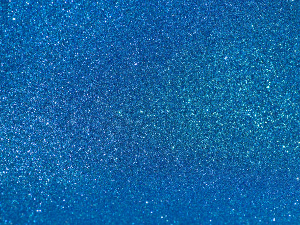 istock Background of blue sparkling sequins 1311069238
