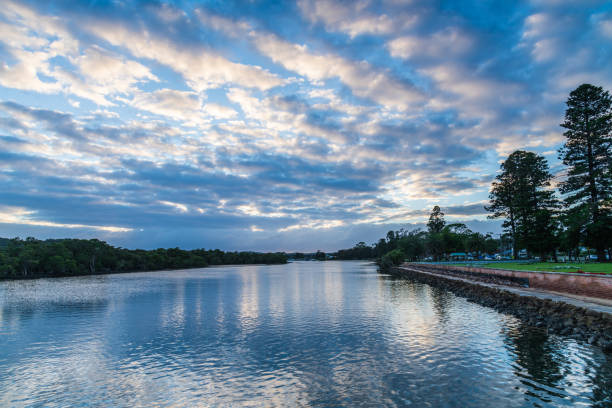 istock Cloudy morning waterscape at the channel 1311069322