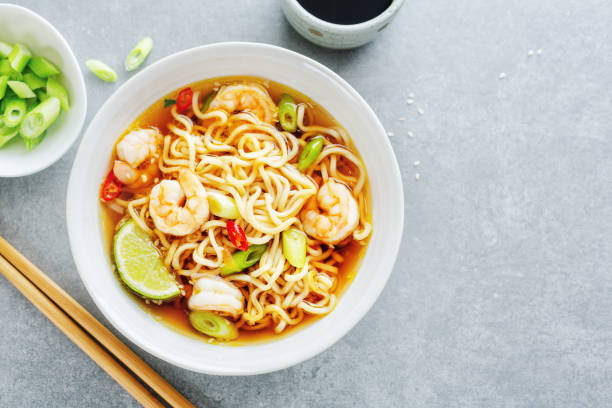 istock Asian noodles on plate on dark background 1311070366