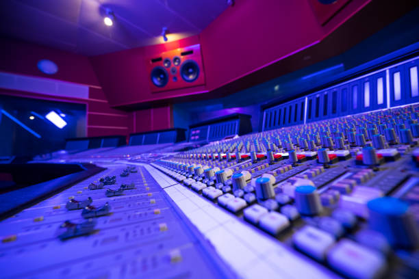 Interior view of recording studio with mixing desk.