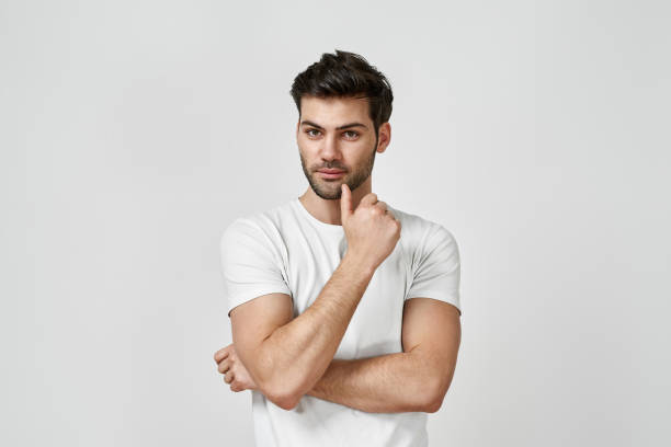 istock Young bearded man wearing in white t-shirt 1311072928