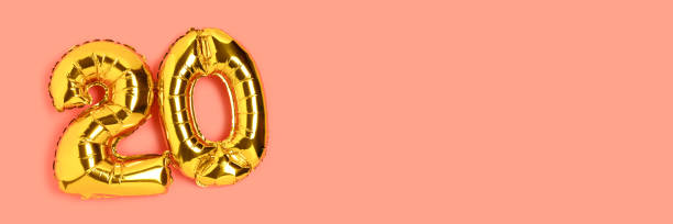 istock Banner with number 20 golden balloons with place for text. 1311073368