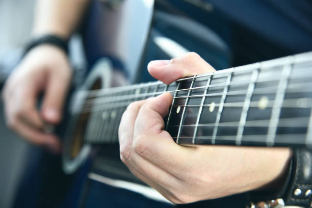 istock Rock musician playing on guitar. 1311074560