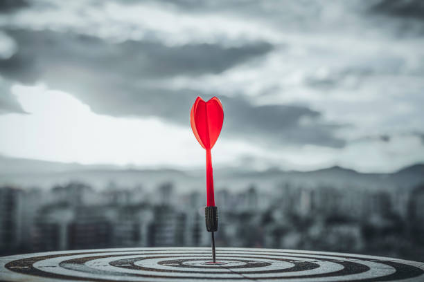 istock Hit the target with an arrow and sunset  background 1311084019