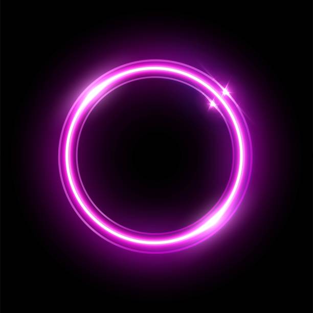 istock Pink neon round frame isolated on black background. Vector shiny violet electric border 1311084029