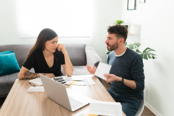 istock Husband discussing their financial problems with his wife 1311084963