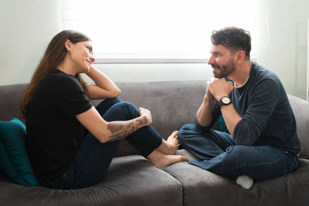 istock Attractive and loving couple talking about their feelings 1311085288