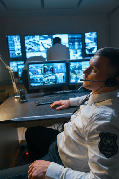 istock A security officer uses a special headset to negotiate a special security connection. 1311087045