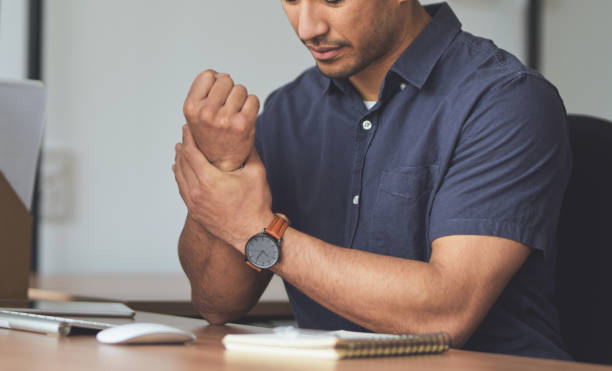 istock Man carpal tunnel syndrome is no laughing matter 1311092374